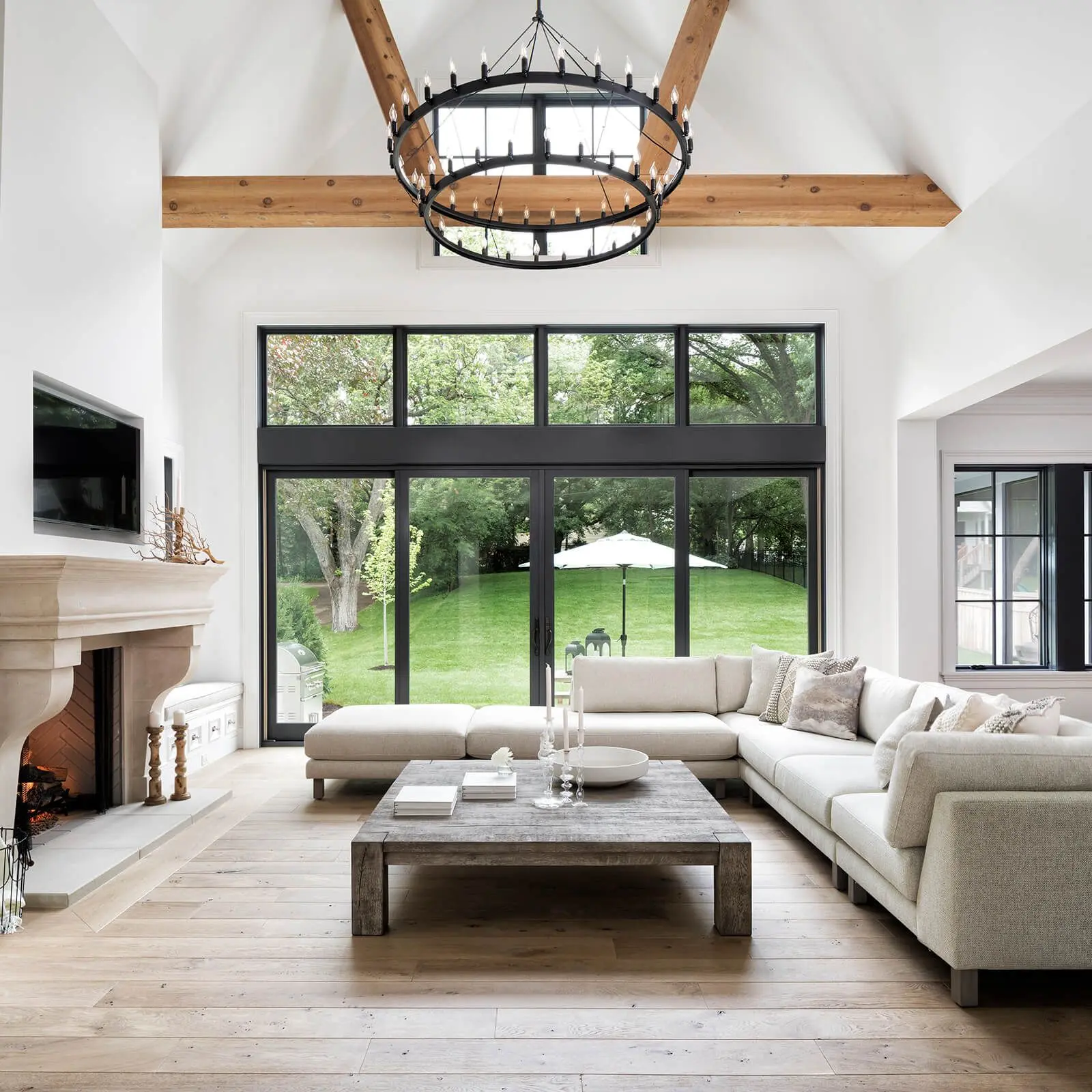 1_m8wb25hzggl4r4axesvv7a-1600x1600 Bright living room with large black-framed windows