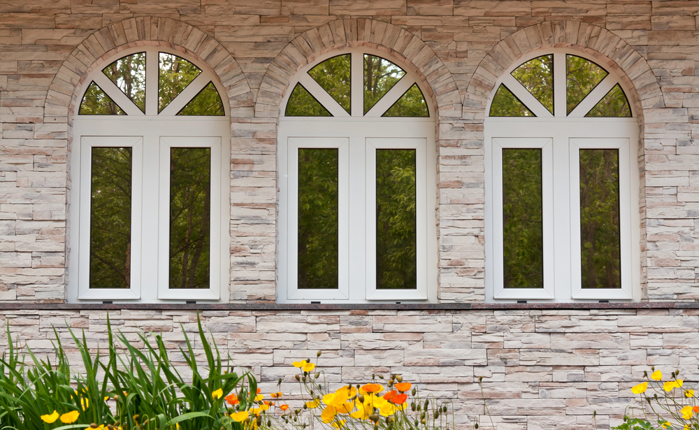 Three windows in the stone wall